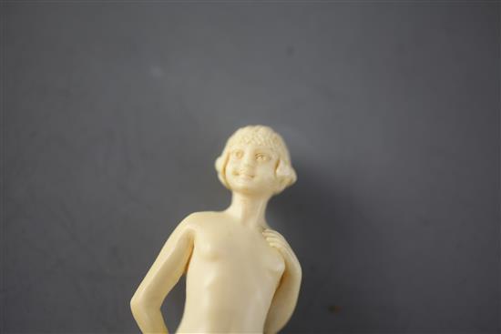 Joe Descamps. A 1930s carved ivory figure of a nude, height 5.75in.